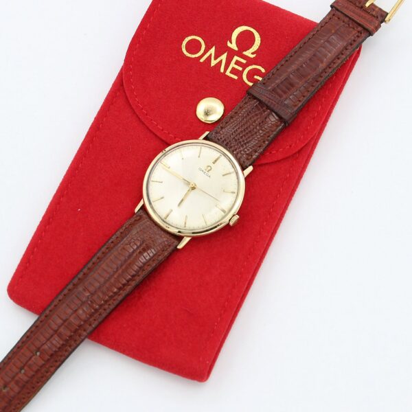 Omega vintage mechanical men's watch in yellow gold